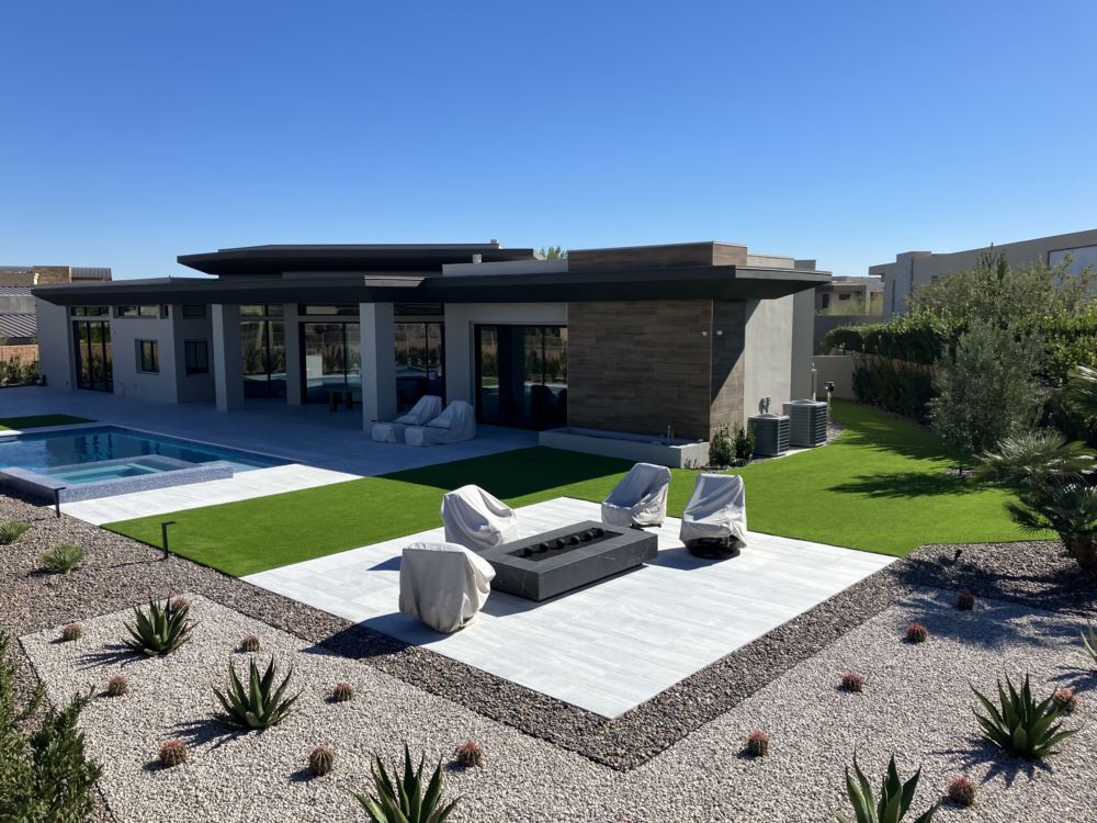 image of a house with artificial turf as the lawn