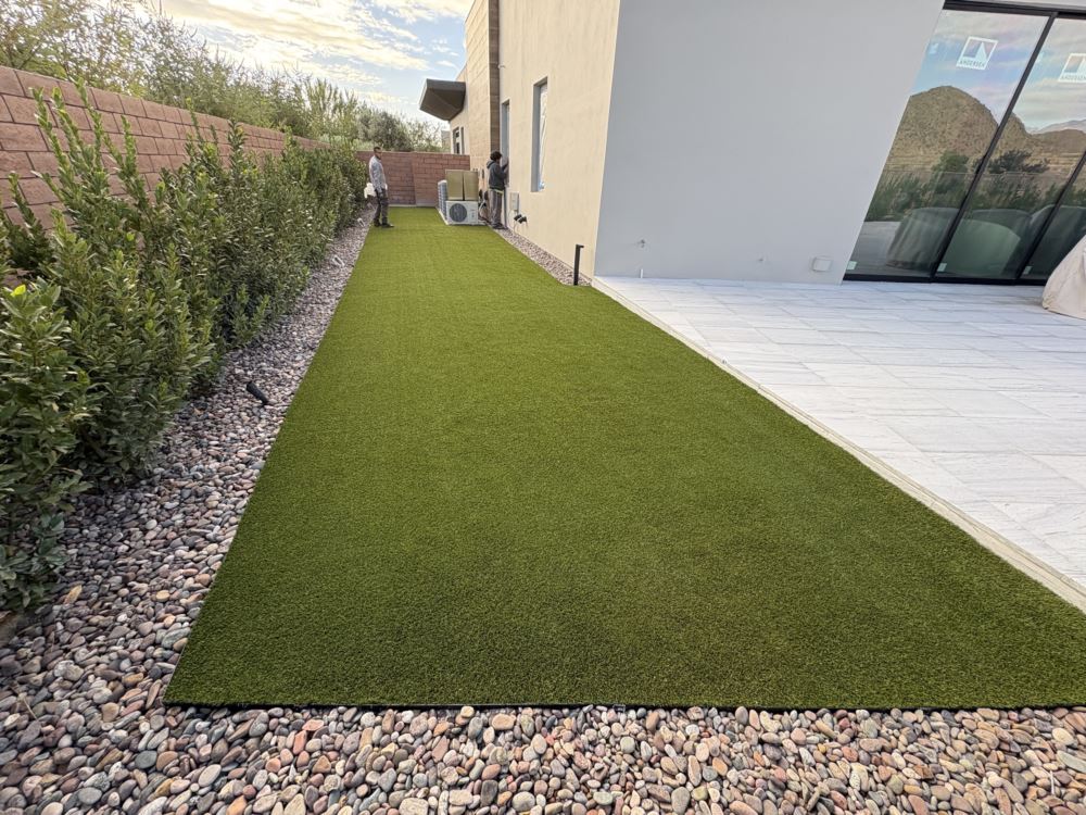 artificial turf used in a narrow strip for pets