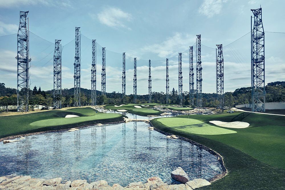 Las Vegas Synthetic grass golf course with water and tall metal towers